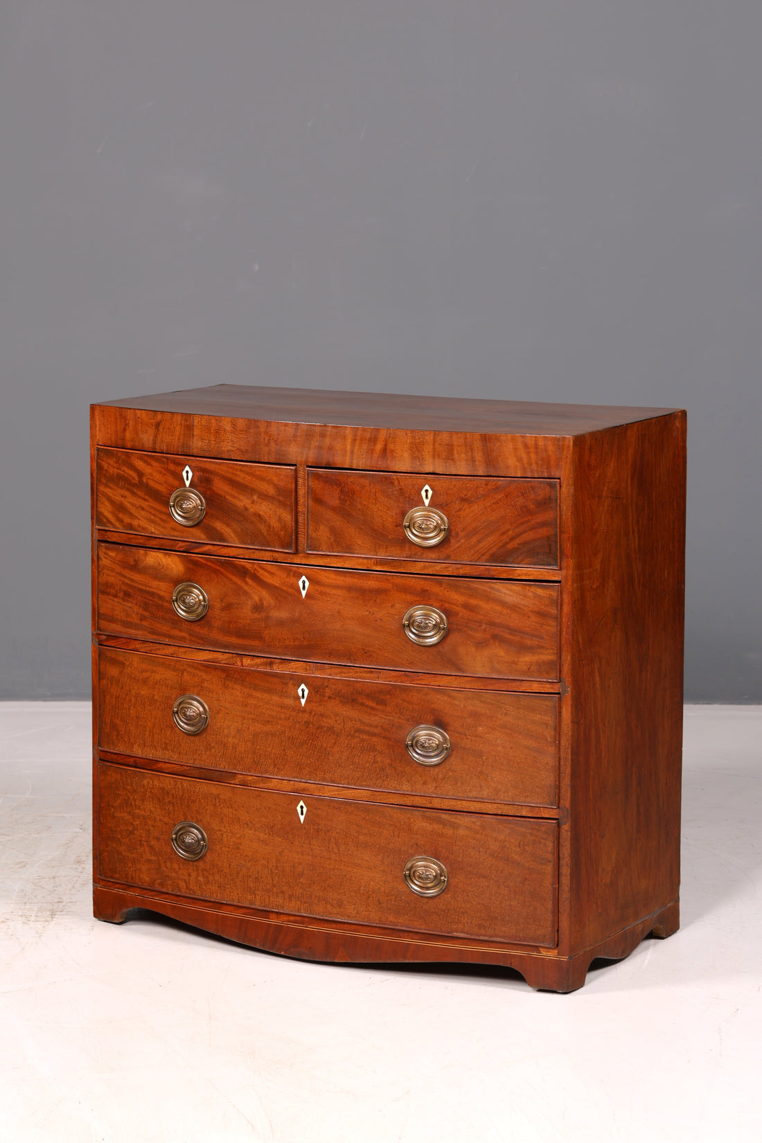 Beautiful antique English mahogany chest of drawers, bow-front cabinet, sideboard, vintage