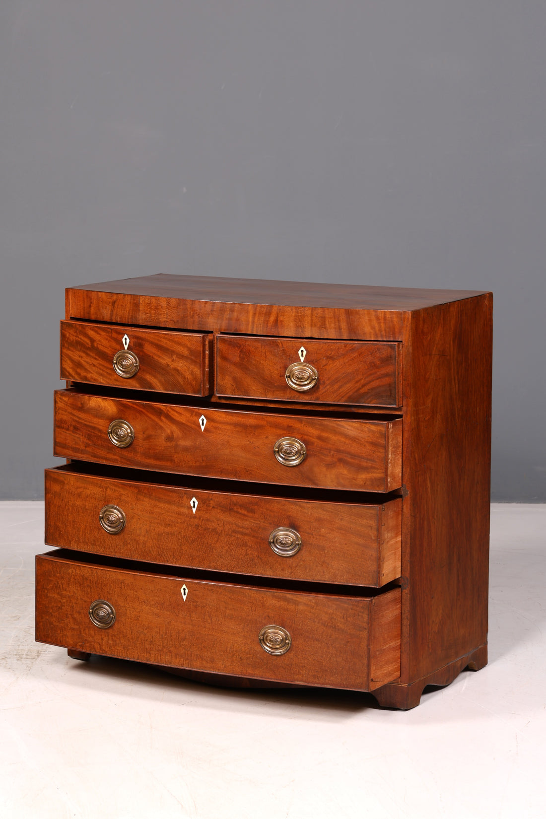 Beautiful antique English mahogany chest of drawers, bow-front cabinet, sideboard, vintage