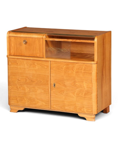 Hauptstadt Möblerei Mid Century Kommode aus Teakholz mit Art Deco Elementen und offenem Fach als Barschrank