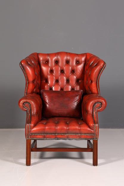 Fauteuil à oreilles Chesterfield original avec repose-pieds en cuir véritable, fauteuil anglais pour homme, fauteuil en cuir, antique et vintage