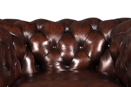 Hauptstadt Möblerei Original Chesterfield Sessel aus braunem Echtleder mit klassischer Knopfheftung